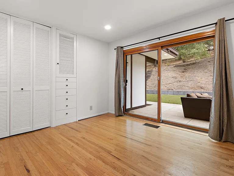 Bedroom 3. Reach-in closet and plenty of built in cabinetry.