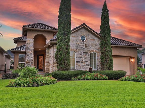 CUSTOM BUILT BY FLAIR BUILDERS LOCATED ON A CORNER CUL DE SAC LOT