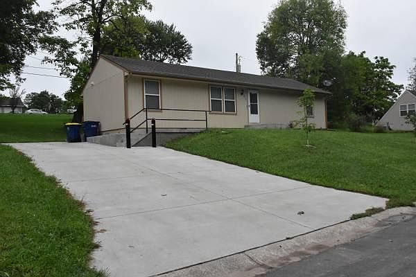 New large concrete driveway with plenty of room to get cars