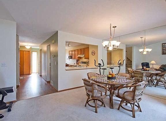 Spacious dining room with look into the kitchen.