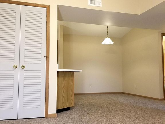 Dining/Living Area with Vaulted Ceiling