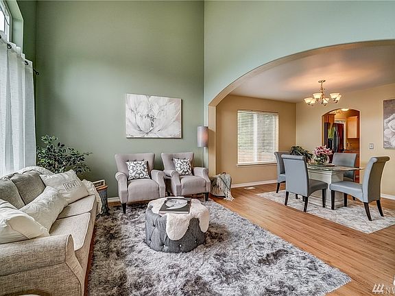 Gorgeous! Spacious home design with great flow...  Excellent living spaces upstairs and down. Lives larger than you'd expect...  TWO 'living' rooms... Dining room plus breakfast nook... Wow!