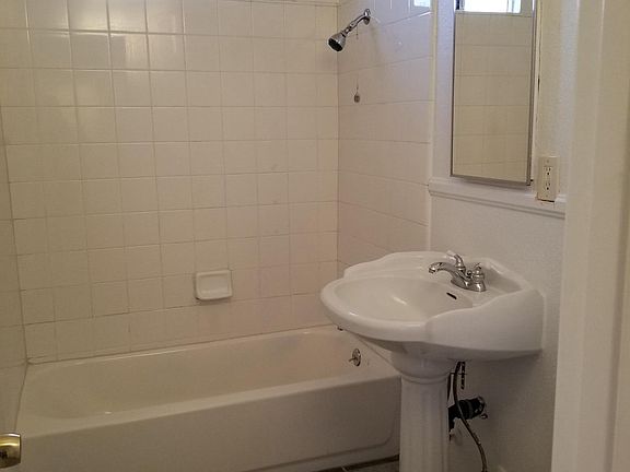 Bathroom completely redone, includes ceiling fan and window 