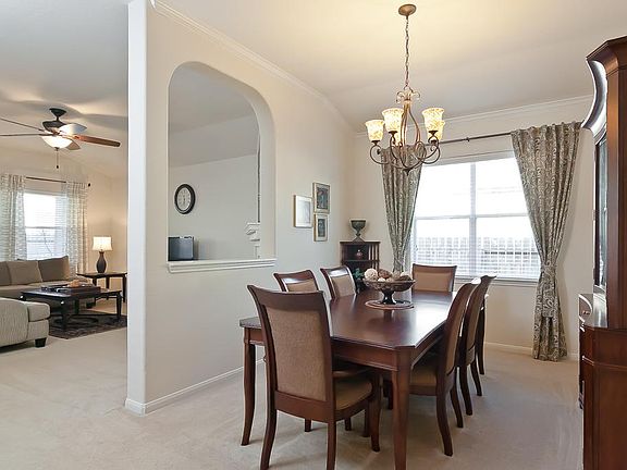 As you walk through the entry, you will find the dining room to your right.
