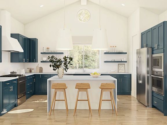 Kitchen with island, pendant lighting and volume ceiling