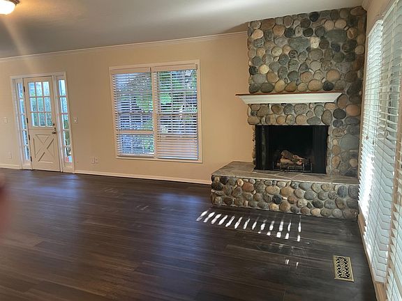 Living room with corner fireplace