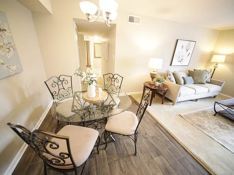 Spacious, landscaped outdoor terrace with lush seating, grills and a fire pit