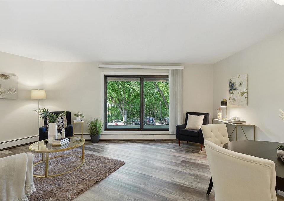living room with view of walkout balcony