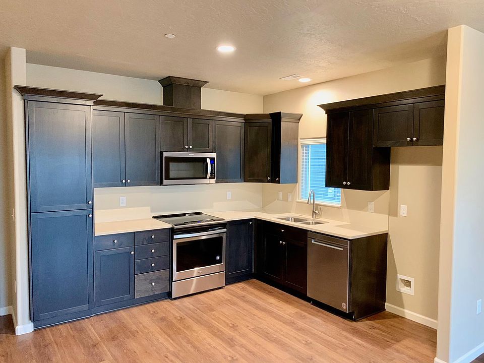 Custom Kitchen Cabinetry. Quartz Countertops and Tile Backsplash. Soft-Close Cabinetry.