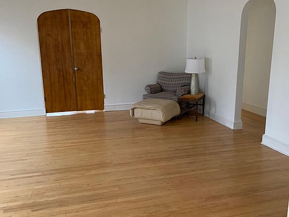 View #2 of Living room. Doors open into Sunroom