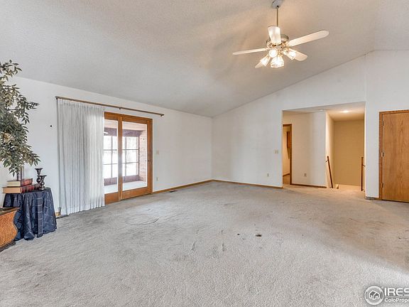 Living room leads to the outside screened in porch