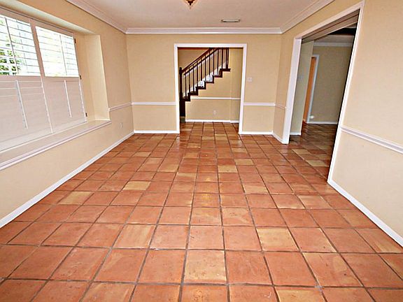 THE FORMAL LIVING ROOM IS THE PERFECT PLACE FOR ENTERTAINING FRIENDS AND FAMILY
