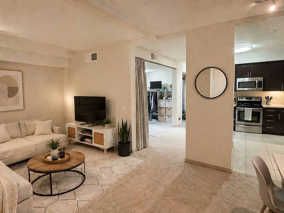 living room, dining room, and kitchen on the first floor with a den or bonus room