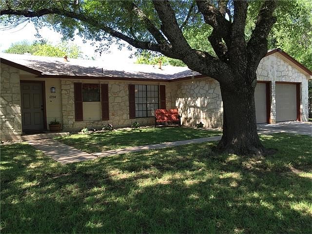 Wonderful shade loving front yard!  Freshly painted on the exterior!