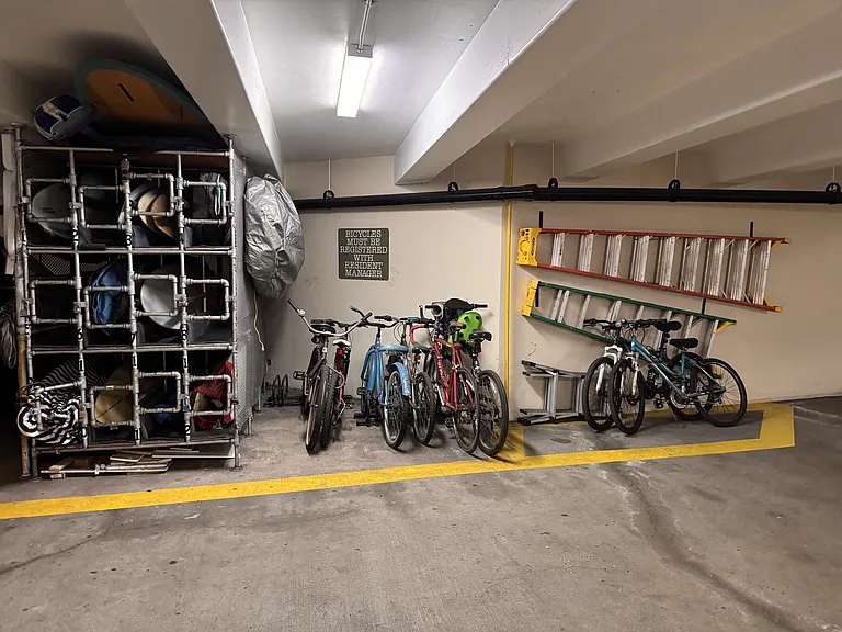 Surfboard and bike storage in garage