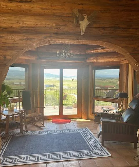 Sunroom with views of Emerald Mountain and Flattops Mountain Range