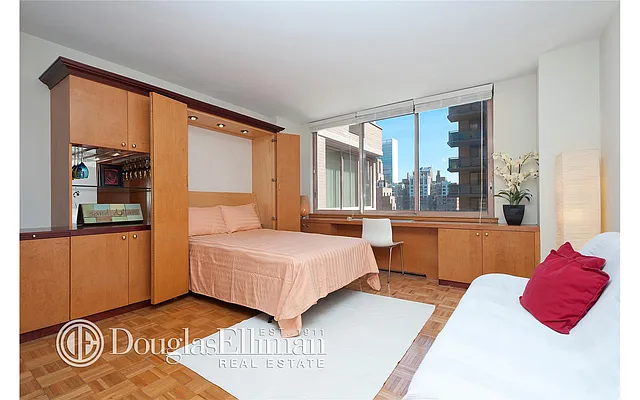 Sold by Douglas Elliman | media 18