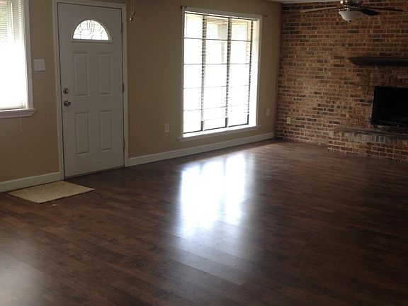 Large Living with wood burning fireplace