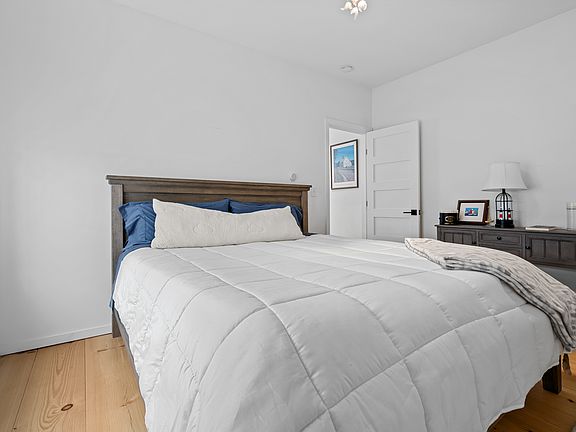 Fits queen bed & 2 nightstands or king bed and side table with dresser along wall