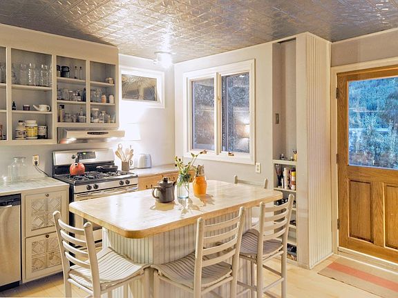 Kitchen, door to porch