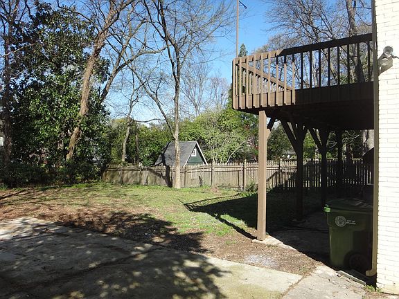 Rear garden, deck and sheltered area underneath deck.