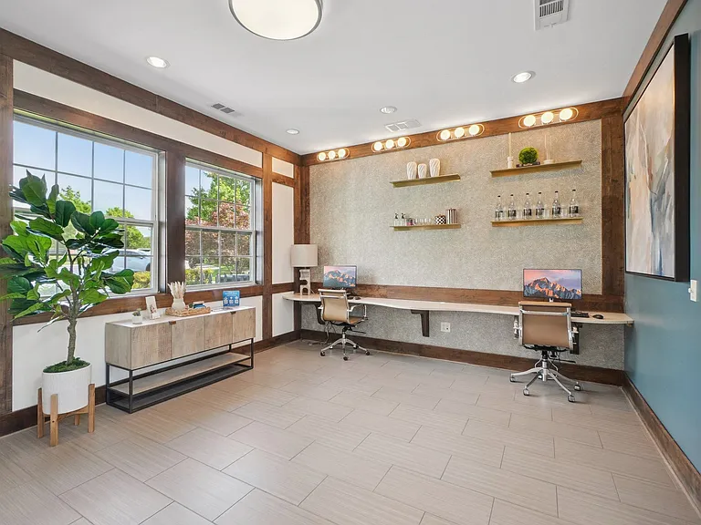 Modern resident business center and coworking space at Village at Broadstone Station in Apex, North Carolina