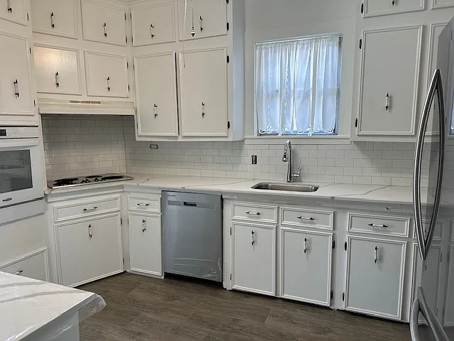 Kitchen -new quartz counters, new sink, new faucet & new disposal - 2400 3rd St