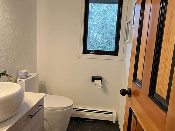 Guest half bath next to kitchen