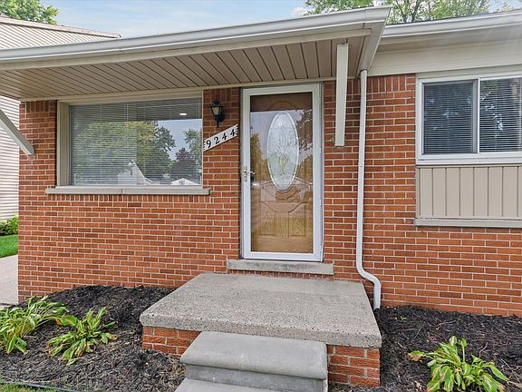 Exterior storm door and front overhang to keep your packages dry from rain!