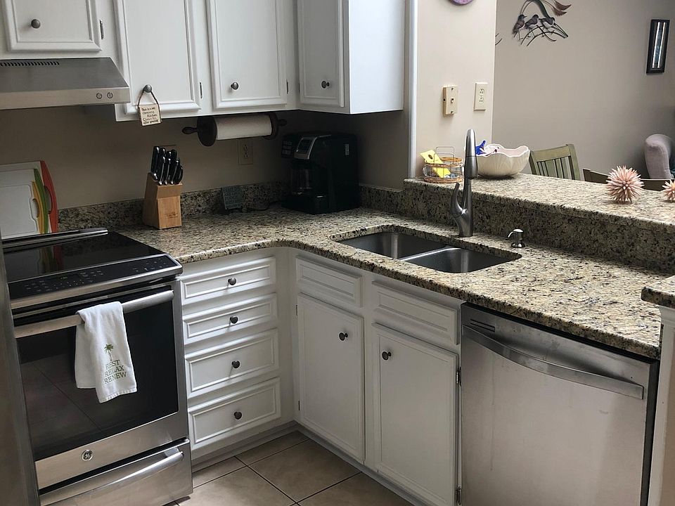Kitchen, tile has been replaced with luxury vinyl plank