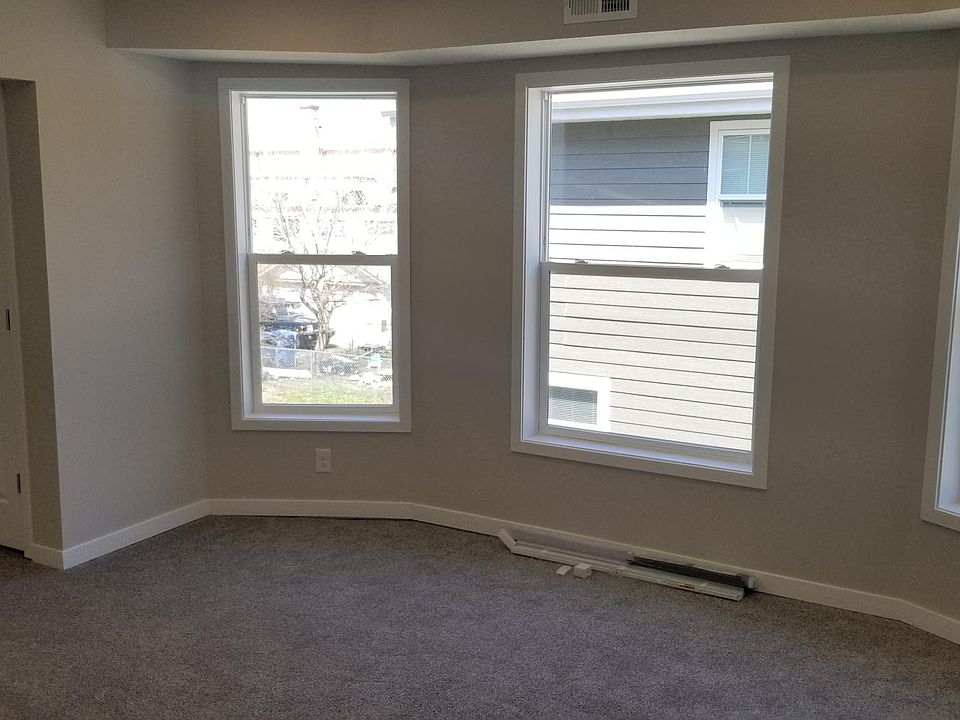 Coming in front door to the Living Room