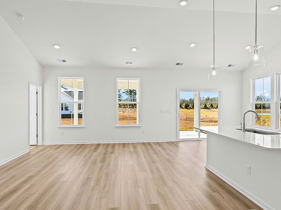 Spacious Easton living room and kitchen designed for effortless everyday living at Chestnut Farms