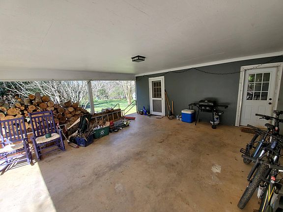 2-car carport (or outdoor rocking chair, grill-out, party room!)