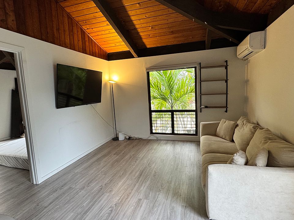 living room with AC. comes with big screen tv, sofa (furniture optional).