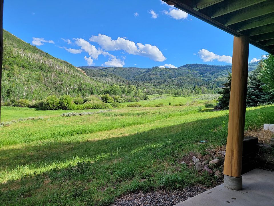 Partial view of gorgeous open space with stream and trails.