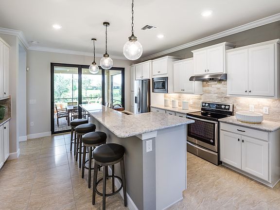 Model Representation Easy access to the extended lanai through the sliding glass doors