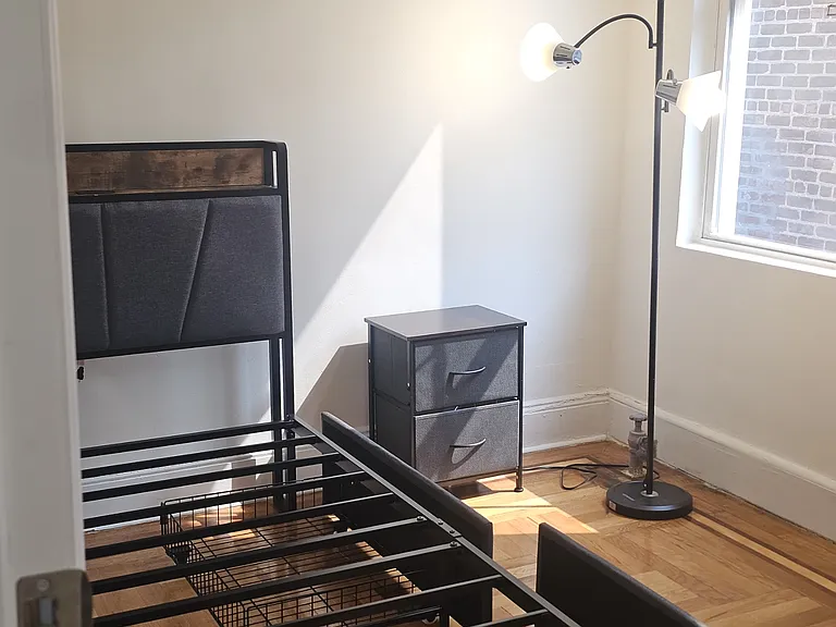 Bed On Left Side of the Room