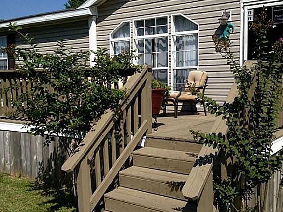 Roomy front porch and landscaping