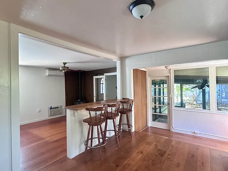 Kitchen / Breakfast Bar looking into Living Room