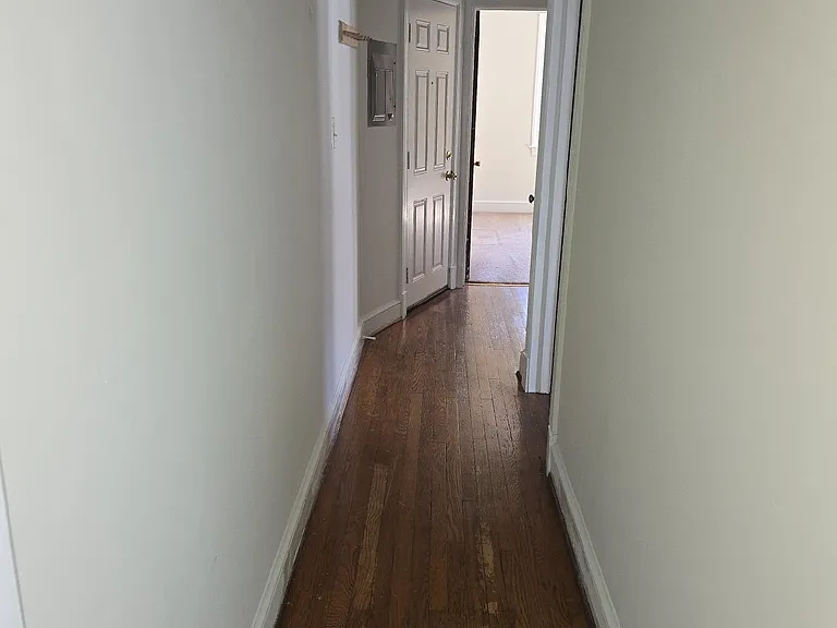 Hallway leading to 2 bedrooms