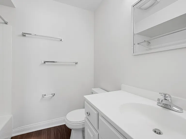 Modern bathrooms feature great lighting and ample storage