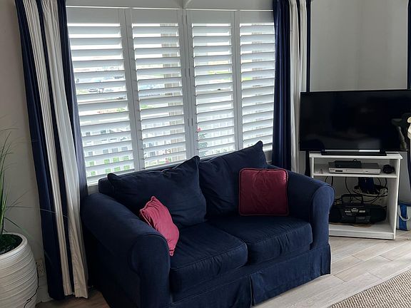 New custom window treatments and new flooring!