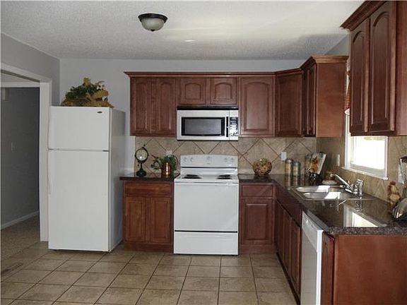 5th image of 6209 E 136th St