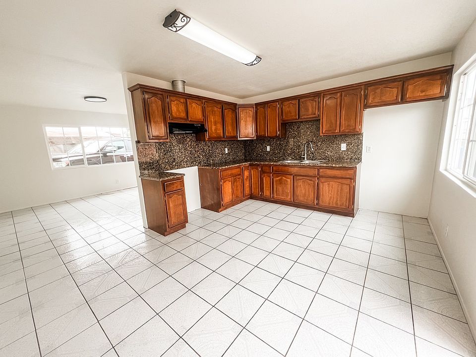 Kitchen with view of living room.