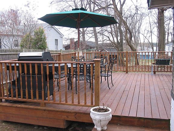 Large multi-tiered back porch perfect for outdoor living
