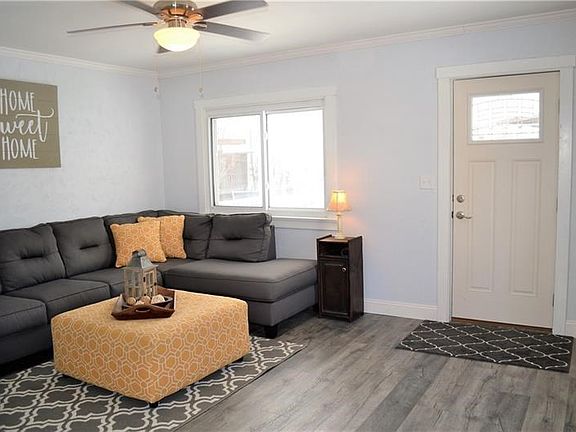 Spacious living room with new laminate flooring