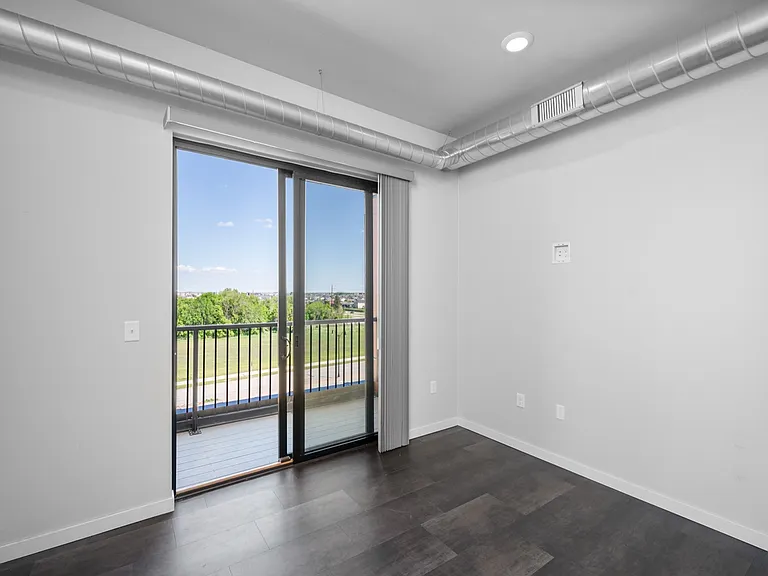Bright apartment with modern open layout, featuring floor-to-ceiling windows and stunning balcony views. Bright apartment with modern open layout, featuring floor-to-ceiling windows and stunning balcony views.