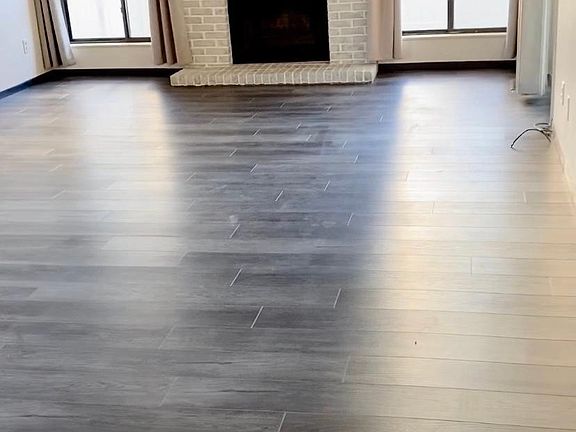 Living room with wood burning fireplace