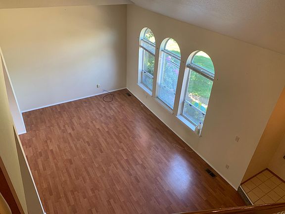 Looking down at living room from top of stairs