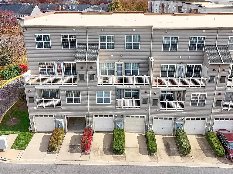Back of home with ample parking